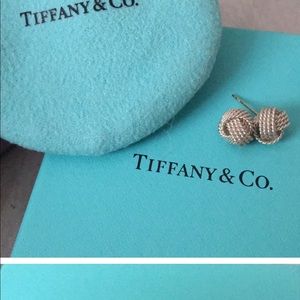 Earrings only ! Box and bag got damaged when moving . Tiffany knot earrings